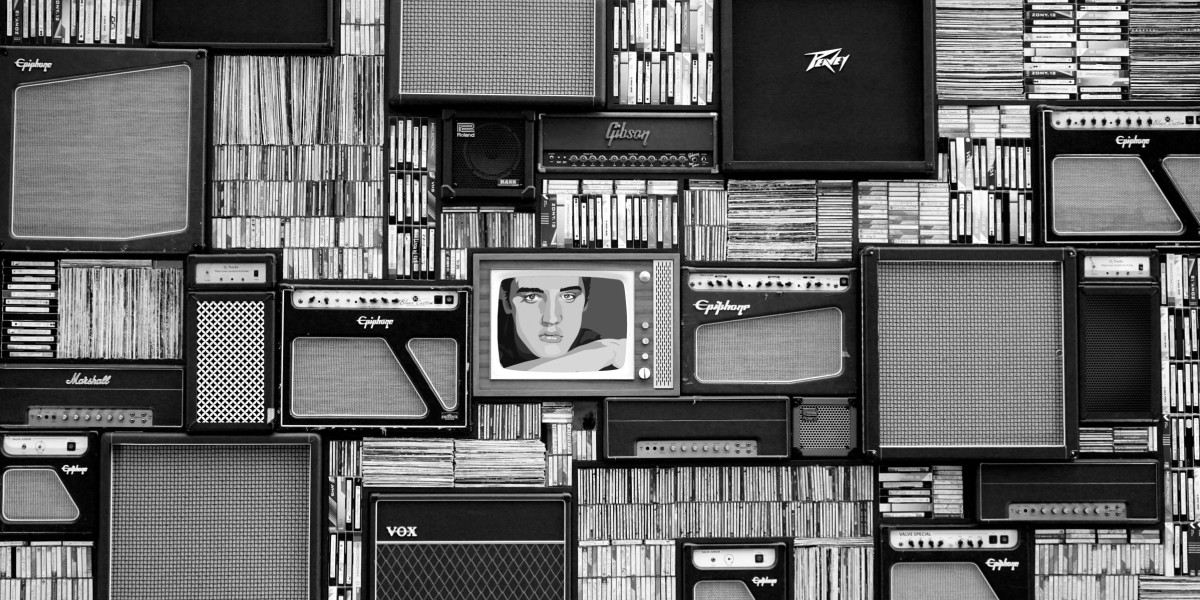 black and white image of old TVs, speakers, and records with a lonely Elvis in the center